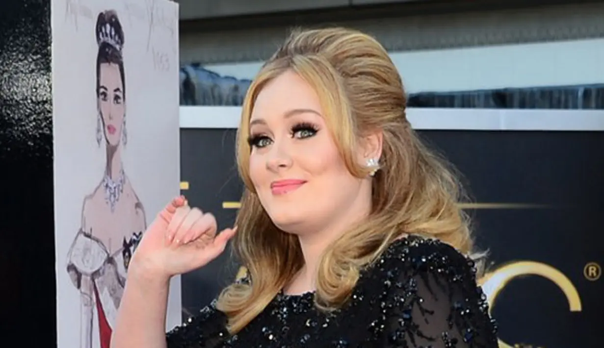 Bahkan sumber juga mengatakan, Adele pun menggunakan bahasa tubuh ketika berbincang dengan suaminya, Simon Konecki. Namun kerusakan pita suara itu sangat membuat Adele terluka. (AFP/FREDERIC J. BROWN)
