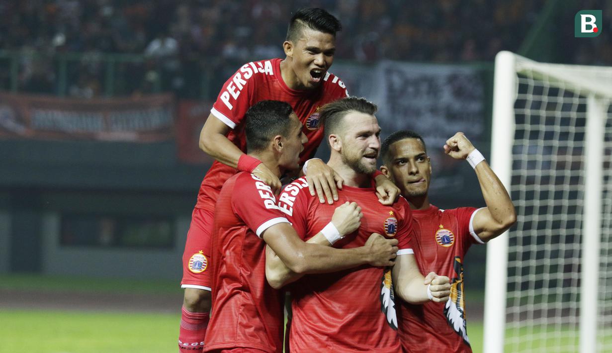 Striker Persija Jakarta, Marko Simic, melakukan selebrasi usai membobol gawang Selangor FA pada laga persahabatan di Stadion Patriot, Jawa Barat, Kamis (6/9/2018).(Bola.com/M Iqbal Ichsan)