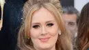 Perpindahan Adele ke London ini sepertinya untuk mengobati kerinduannya pada kampung halaman. Bersama suami dan anak laki-lakinya, Adele akan menetap selamanya di rumah mewah yang sudah dibelinya. (AFP/Bintang.com)