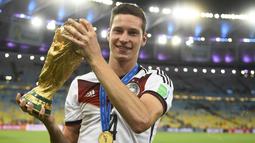 Ketika masih berusia 21 tahun, Julian Draxler sudah dipercaya untuk masuk ke skuat Jerman untuk Piala Dunia 2014. Namun Draxler hanya satu kali diberikan kesempatan bermain, yakni ketika bertemu Brasil di babak semifinal. (AFP/Fabrice Coffrini)