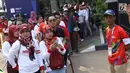 Kondisi antrian calon penonton seremoni pembukaan Asian Games 2018 jelang masuk kawasan GBK, Jakarta, Sabtu (18/8). Asian Games 2018 akan berlangsung hingga 2 September, mendatang. (Liputan6.com/Helmi Fithriansyah)