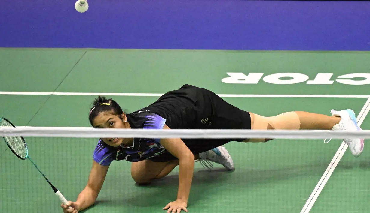 Gregoria Mariska Tunjung unggul dua set langsung (21-9, 21-18). (Peter PARKS/AFP)