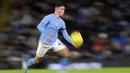 Petaka Chelsea masih belum usai di babak pertama. Pada menit ke-38, The Blues tertinggal 0-3 setelah Phil Foden sukses mengkonversi umpan tarik Kyle Walker dari sisi kanan menjadi gol. (AFP/Oli Scarff)