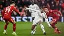 Bermain kandang, The Reds sukses membekuk juara bertahan Liga Champions, Real Madrid dengan skor 2-0. (Oli SCARFF/AFP)