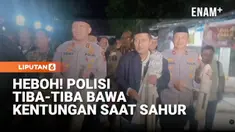 Polisi di Subang, Jawa Barat, berkeliling kampung membantu warga membangunkan sahur dengan menabuh kentungan dan bedug, Jumat dini hari. Kegiatan yang berlangsung di Desa Rancasari, Kecamatan Pamanukan, Kabupaten Subang ini dilakukan bersama warga se...