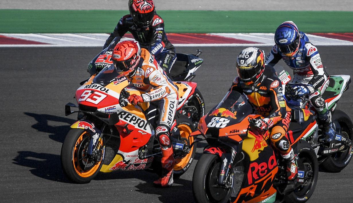 Kembalinya Marc Marquez di lintasan balap MotoGP diyakini bakal menambah sengit rivalitas para pembalap. (Photo by PATRICIA DE MELO MOREIRA / AFP)
