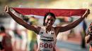 Atlet Lompat Jauh Indonesia, Maria Natalia Londa saat beraksi dalam laga nomor triple jump putri SEA Games di Stadium Bukit Jalil, Malaysia, Rabu (23/8). Maria Natalia Londa berhasil meraih medali perak. (Liputan6.com/Faizal Fanani)