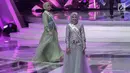 Finalis asal Indonesia dan Malaysia yang lolos dalam malam puncak Puteri Muslimah Asia 2018 di Jakarta, Senin (7/5). (Liputan6.com/Faizal Fanani)