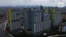 Foto aerial suasana Rumah Sakit Darurat Penanganan COVID-19 Wisma Atlet Kemayoran, di Jakarta, Selasa (2/2/2021). Pemerintah melalui Kemenkes mengizinkan semua rumah sakit jika memiliki fasilitas penanganan COVID-19 untuk memberikan layanan ke pasien COVID-19. (merdeka.com/Imam Buhori)
