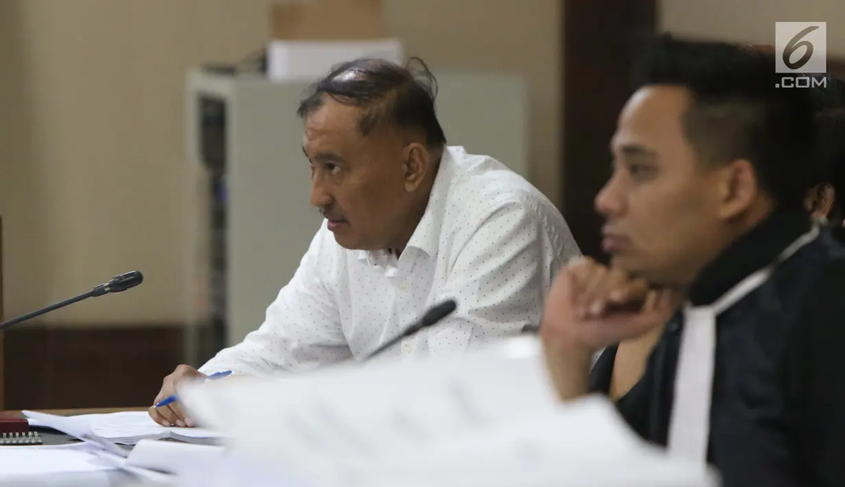 Terdakwa dugaan korupsi e-KTP, Markus Nari saat mengikuti sidang lanjutan di Pengadilan Tipikor, Jakarta, Rabu (11/9/2019). Sidang mendengar keterangan saksi-saksi, salah satunya Diah Anggraeni. (Liputan6.com/Helmi Fithriansyah)