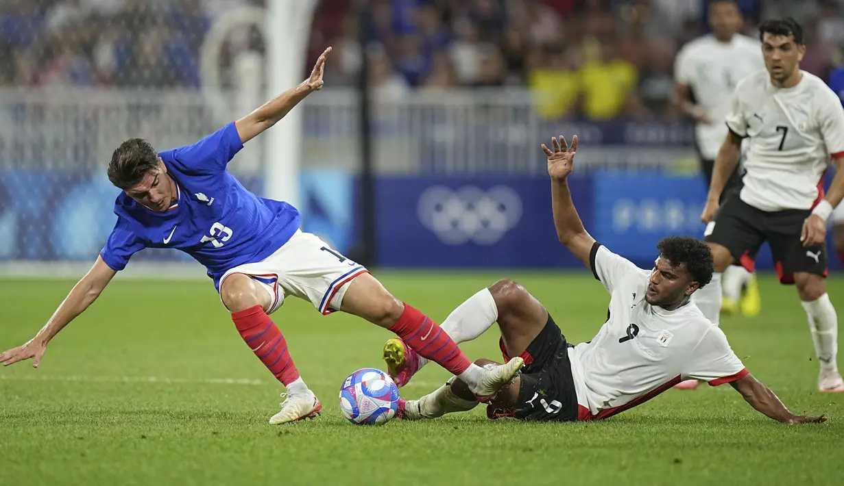 Kali ini, laga menyuguhkan drama 120 menit pertandingan. Mesir bukan lawan yang mudah bagi Prancis, pertandingan cukup seimbang dan alot. (AP Photo/Laurent Cipriani)