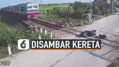 JATUH DI PERLINTASAN, PEMOTOR NYARIS DISAMBAR KERETA API