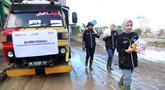 Relawan BRI Peduli terjun langsung ke lokasi bencana di Kabupaten Aceh Tamiang untuk menyalurkan bantuan kepada masyarakat terdampak banjir bandang dan longsor. Foto: BRI