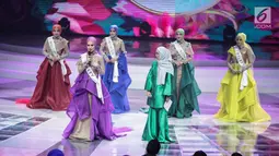Ekspesi finalis asal Turki saat menjawab pertanyaan yang diajukan dewan juri dalam malam puncak Puteri Muslimah Asia 2018 di Jakarta, Senin (7/5). (Liputan6.com/Faizal Fanani)