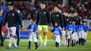 <p>Pemain Timnas Indonesia U-20 memasuki lapangan pertandingan saat laga Grup F Kualifikasi Piala Asia U-20 2025 melawan Timor Leste di Stadion Madya, Senayan, Jakarta, Jumat (27/09/2024). (Bola.com/Bagaskara Lazuardi)</p>