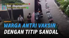 Cara unik dan kreatif sekumpulan warga saat antri Vaksinasi Covid-19 dengan menggunakan sandal.