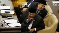 Abraham Lunggana atau Haji Lulung saat menghadiri pelantikan anggota DPR, MPR, dan DPD di Kompleks Parlemen, Jakarta, Selasa (1/10/2019). Haji Lulung berhasil melenggang mulus menjadi legislator DPR RI periode 2019-2024. (Liputan6.com/JohanTallo)