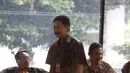 Rully yang datang sekitar pukul 09.10 WIB terlihat ditemani oleh sejumlah ajudannya di Gedung KPK, Jakarta, Jumat (13/6/14). (Liputan6.com/Johan Tallo)