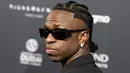 Pemain Real Madrid, Vinicius Jr menghadiri acara Globe Soccer Awards yang berlangsung di Dubai, Uni Emirat Arab, Jumat (27/12/2024) waktu setempat. (AFP/Fadel Senna)