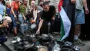 Aksi simbolik ini muncul di tengah situasi kelaparan yang makin mengkhawatirkan di Gaza. (Rhianna Chadwick/AFP)