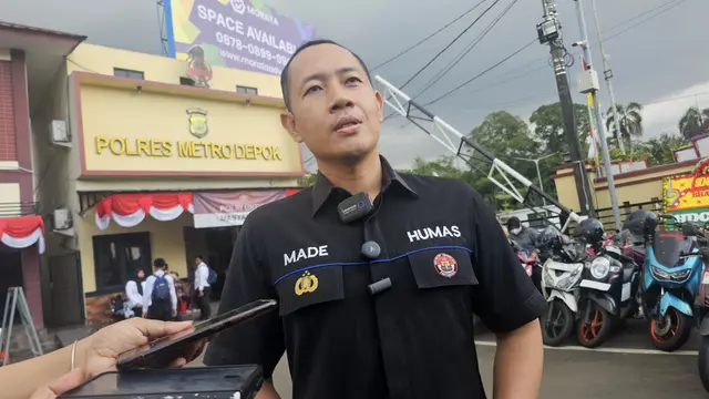 Kasi Humas Polres Metro Depok, AKP Made Budi saat ditemui di halaman Polres Metro Depok. (Liputan6.com/Dicky Agung Prihanto)