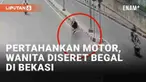 Aksi begal sadis terjadi di depan Masjid Jl. Bosih Raya, Cikarang Barat, Kabupaten Bekasi. Korban seorang wanita berusaha mempertahankan motornya hingga terseret di jalanan. Korban terseret hingga kolong underpass Stasiun Cibitung.