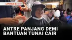 Ribuan warga mengantre pencairan dana Bantuan Langsung Tunai di kantor pos Kota Bekasi, Jawa Barat. Meski harus mengantre lama, bantuan uang tunai sebesar Rp.900.000 ini sangat membantu perekonomian warga disaat harga kebutuhan pokok tinggi.
