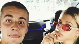 Justin Bieber daN Sofia Richie saat bercanda di dalam mobil, Jepang. Hubungan Justin Bieber dan Sofia Richie tidak mendapatkan restu dari penggemar. Para penggemar mengungkapkan rasa kesalnya terhadap pelantun lagu 'Purpose' ini. (Instagram/sofiarichie)
