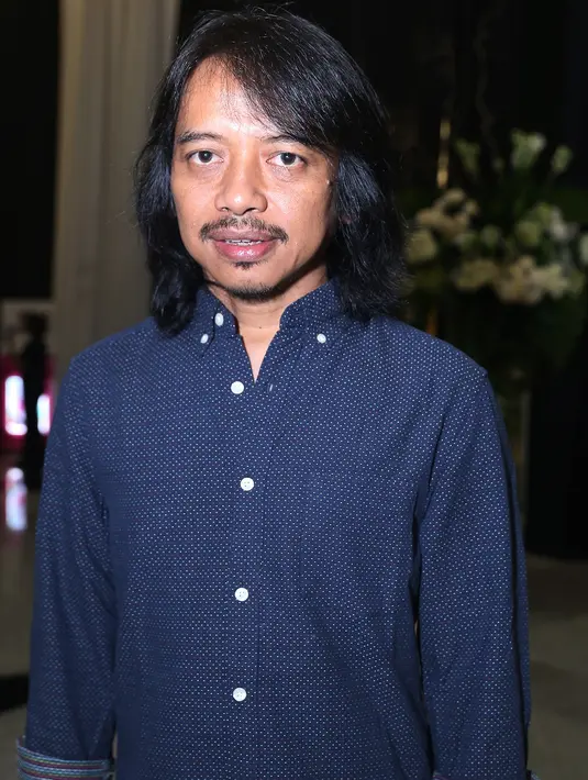"Saya ingin nonton karena ada Arman nyanyi dan musiknya juga Tohpati yang garap, jadi banyak teman. Saya ingin dengar aransemennya Tohpati," ujar musisi 52 tahun itu. (Andy Masela/Bintang.com)