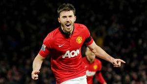 Michael Carrick - Pria berusia 40 tahun ini akan selalu dikenang sebagai salah satu gelandang elit di Liga Inggris. Carrick telah memenangkan lima gelar Premier league serta satu gelar Liga Champions bersama Manchester United. (AFP/Andrew Yates)
