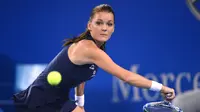 Petenis Agnieszka Radwanska asal Poland saat beraksi di China Open tennis tournament, Beijing, Selasa (06/10/2015). (AFP Photo / Wang Zhao)
