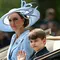 Kate Middleton menaiki kereta kuda bersama Pangeran Louis di parade Trooping the Color 2026. (dok. JUSTIN TALLIS / AFP)