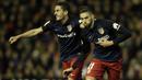 7. Gelandang Atletico Madrid, Yannick Ferreira, merayakn gol yang dicetaknya ke gawang Valencia pada laga La Liga Spanyol di Stadion Mestalla, Minggu (6/3/2016). Valencia takluk 1-3 dari Atletico Madrid. (AFP/Jose Jordan)
