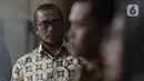 Komisioner KPU Pusat, Hasyim Asy'ari tiba untuk dimintai keterangan oleh penyidik di Gedung KPK, Jakarta, Jumat (24/1/2020). Hasyim diperiksa sebagai saksi terkait kasus dugaan penerimaan hadiah atau janji penetapan anggota DPR Terpilih 2019-2024. (merdeka.com/Dwi Narwoko)