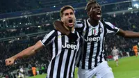 Selebrasi Fernando Llorente setelah mencetak gol bersama Paul Pogba pada pertandingan sepak bola Liga Champions Grup B antara Juventus melawan Real Madrid di Juventus Stadium, Torino. Pada Selasa (05/11/13) waktu setempat. (AFP/Giuseppe Cacace)