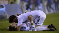Gareth Bale dan Xabi Alonso (DANI POZO / AFP)