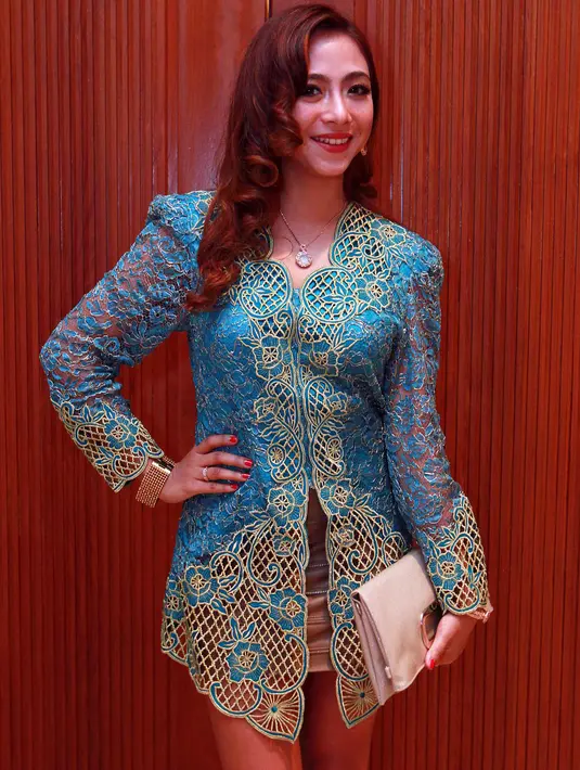 "(Momongan) belum, masih santai. Menunda sih iya, sebentar aja ga lama," kata Nadia Vega di Jakarta Convention Center (JCC), Senayan, Jakarta Pusat, Jumat (14/8/2015). (Deki Prayoga/Bintang.com)