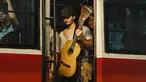 Berperan sebagai pengamen jalanan, tentu Bryan Domani tak lupa untuk membawa gitar. Ini adalah salah satu scene, di mana kakak kandung Megan Domani ini sedang ngamen di dalam bus umum. Aksi Bryan menjadi seorang pengamen ini sudah dapat ditonton melalui platform Vidio. (Liputan6.com/IG/@bryandomani_bd_)