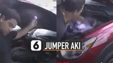 Ada-ada saja yang dilakukan seorang pria ini karena jumper aki mobil menggunakan tubuhnya.