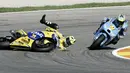  Momen pahit pertama Valentino Rossi terjadi pada MotoGP Valencia 2006. Rossi harus merelakan gelar juara dunia MotoGP yang sudah di depan mata disabet Nicky Hayden akibat terguling di sebuah tikungan pada lap ke-5. (AFP/Jose Jordan)