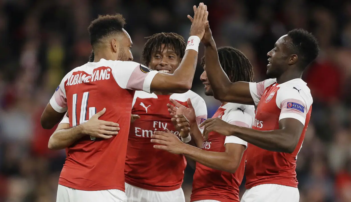 Pemain Arsenal merayakan gol yang dicetak oleh Pierre-Emerick Aubameyang ke gawang Vorskla pada laga Liga Europa di Stadion Emirates, London, Kamis (20/9/2018). Arsenal menang 4-2 atas Vorskla. (AP/Kirsty Wigglesworth)