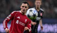 Gelandang Liverpool asal Jerman #07, Florian Wirtz, mengontrol bola dalam pertandingan Liga Champions UEFA antara Eintracht Frankfurt dan Liverpool FC di Frankfurt, Jerman Barat, pada 22 Oktober 2025. (Kirill KUDRYAVTSEV/AFP)
