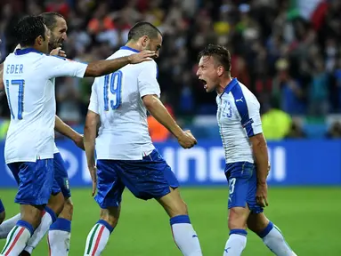 Italia meraih kemenangan 2-0 atas Belgia pada laga Grup E Piala Eropa 2016 di Stade de Lyon, Lyon, Selasa (14/6/2016) dini hari WIB. (AFP/Emmanuel Dunand)