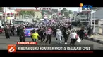 Aksi unjuk rasa dilakukan dengan long march dari halaman Kampus UPI Purwakarta hingga taman kota di area Situ Buled, Purwakarta.
