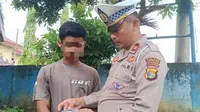 Supir truk yang menggunakan SIM palsu diamankan di Mapolres Lampung Utara. Foto: (Polres Lampung Utara)