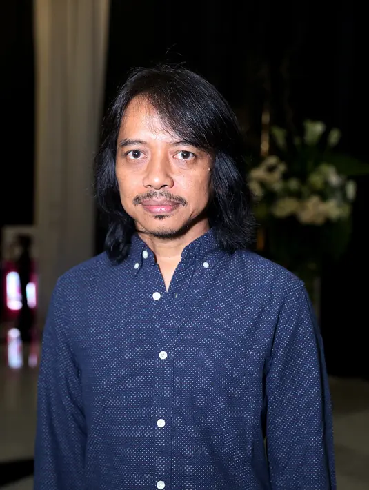 Gitaris band Gigi ini punya alasan lain dalam nonton konser perjalanan 30 tahun Diva Malaysia, Sheila Majid tersebut. (Andy Masela/Bintang.com)