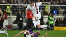 AC Milan berhasil mengandaskan perlawanan tim tuan rumah, Fiorentina dengan skor 2-1. (Alberto PIZZOLI/AFP)