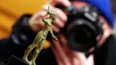 Patung Herakles yang sempat dicuri ini, rencananya akan dikembalikan kepada pemerintah Italia, New York, Selasa (24/2/2015). Herakles adalah pahlawan mitologi Yunani yang lebih dekenal dengan nama Hercules (AFP Photo/Jewel Samad)