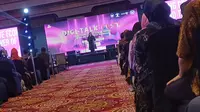 Direktur Izin Tinggal Keimigrasian Direktorat Jenderal Imigrasi Kemenkumham, Pramella Yunidar Pasaribu dalam acara Digi-Talk Fest di Ritz Carlton Mega Kuningan Hotel, Jakarta, Rabu (13/9/2023). (Maulandy/Liputan6.com)