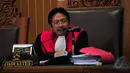 Hakim Haswandi memerintahkan kepada KPK untuk menghentikan proses penyidikan dan penetapan tersangka kepada Hadi Poernomo untuk dicabut, Selasa (26/5/2015). (Liputan6.com/Yoppy Renato)